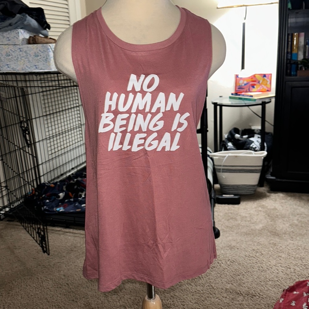 “No human being is illegal” muscle tank